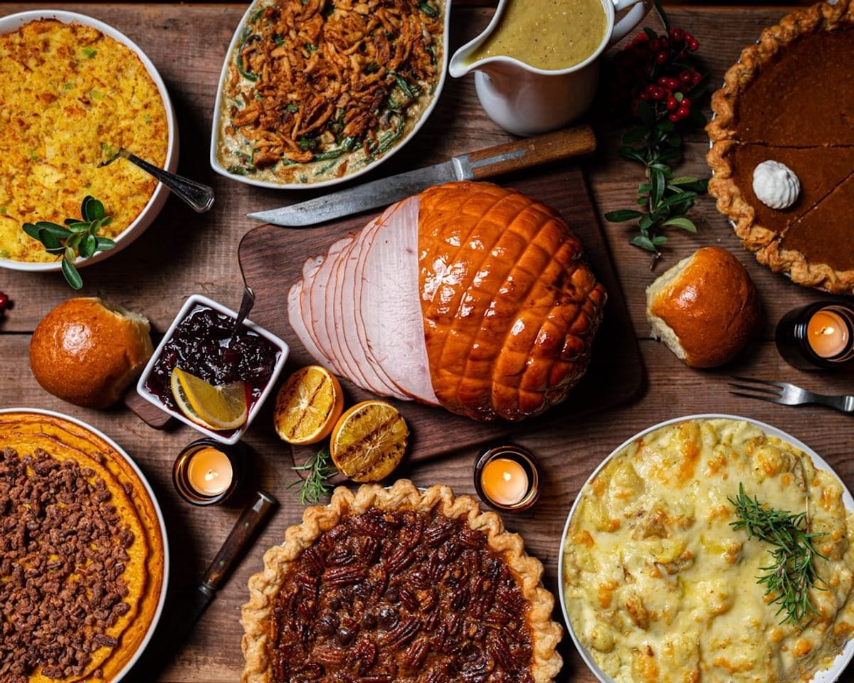 Apartment Amenity | Festive dinner spread with ham and pies