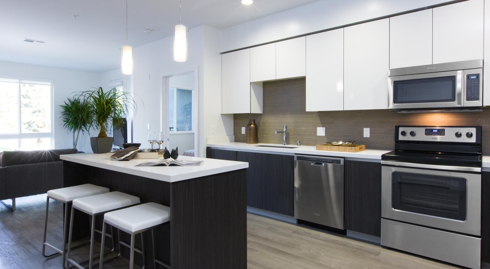 Sustainable Living in Comfort | AIRE Makes Life Effortless Sustainable Living in Comfort | Image of apartment's kitchen area