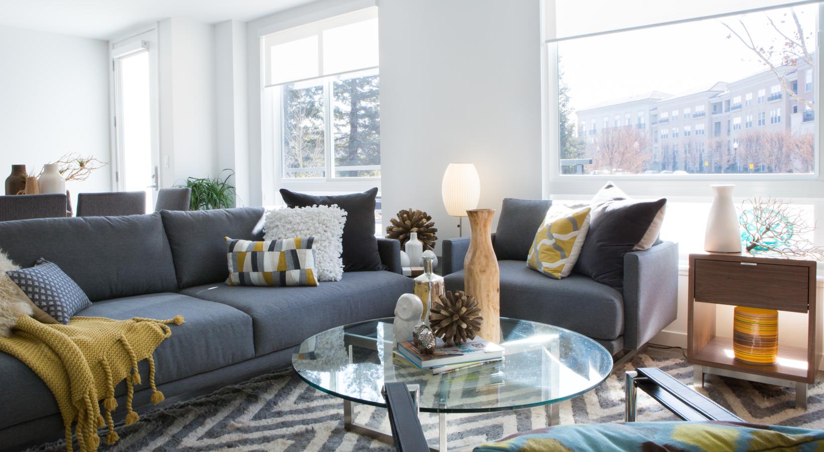 Gorgeous natural light in your living space a living room with a large window