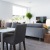 a living room with a couch and chairs