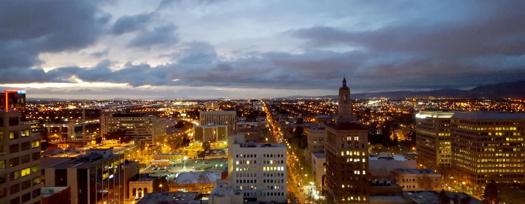 Luxury Apartments | a city landscape at dusk