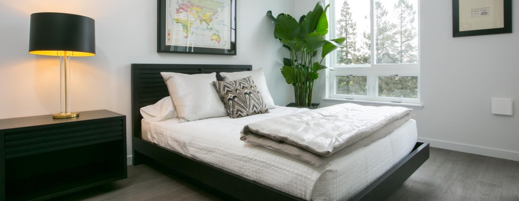bedroom with bed and table with lamp