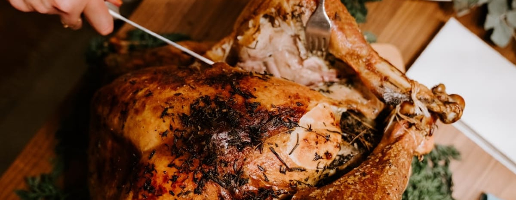 Apartment Amenity | Carving golden brown holiday turkey