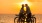 a man and woman on a bicycle