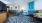 a living room with blue couches